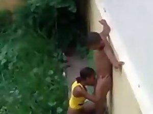 Peeping on a teenage blowjob outside Picture 1