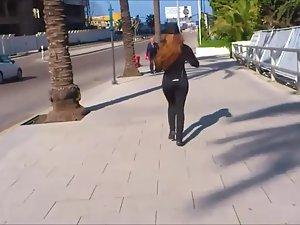 Jogging girl prepares music for her run Picture 5