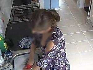 Spy her boobs while she does the dishes Picture 1