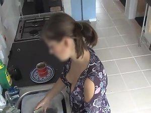 Spy her boobs while she does the dishes Picture 4