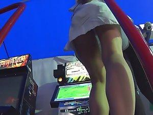 Upskirt of teen girl dancing and playing game Picture 1