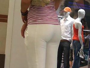 Hot tanned girl in tight white pants Picture 7