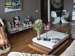 Blowjob spied in living room Picture 1