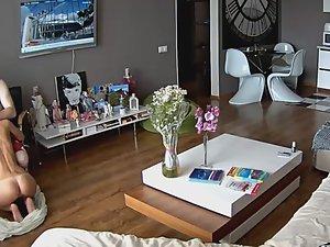 Blowjob spied in living room Picture 2