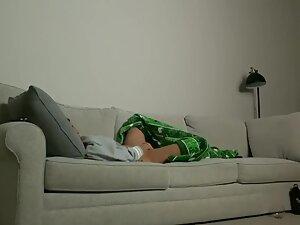 Spying her finger pussy while watching tv Picture 7