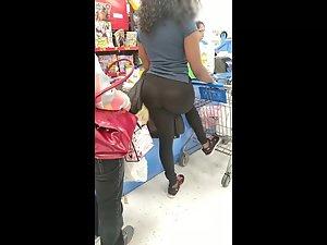 Curly black girl with big booty in spandex