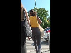 Stunning movement of black booty in grey leggings Picture 7