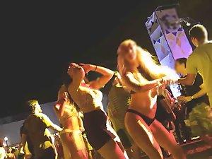 Sluts dancing together on a beach party