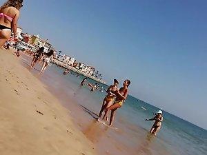 Three exceptional butts in thongs and one hot topless Picture 2