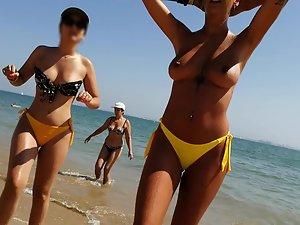 Three exceptional butts in thongs and one hot topless Picture 5