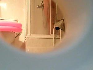 Peeping nude sister taking a shower Picture 5
