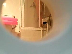 Peeping nude sister taking a shower Picture 6