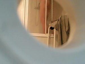 Peeping nude sister taking a shower Picture 7