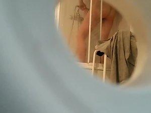Peeping nude sister taking a shower Picture 8