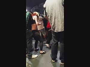 Tattooed white girl grinds on black guy during concert Picture 5