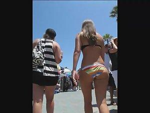 Hypnotic ass in a colored bikini Picture 1