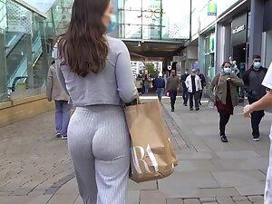 Bubble butt wiggles in a magical way in grey pants