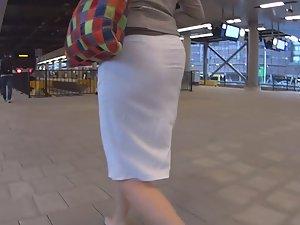 Milf's thong in see through white skirt Picture 4