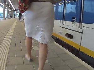 Milf's thong in see through white skirt Picture 6