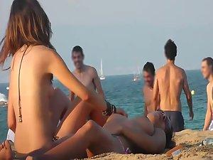 Voyeur notices lesbian girls on a beach Picture 6
