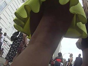Upskirt of smug girl's hot ass in yellowish dress Picture 8