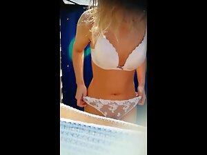 Peeping on hot pussy in erotic panties in the beach cabin Picture 4