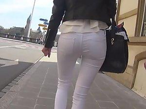Gorgeous teen girl in tight white pants