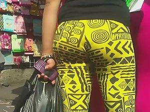 Cocky girl in tight yellow leggings