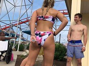 Amazing tattooed girl at water park entrance Picture 8