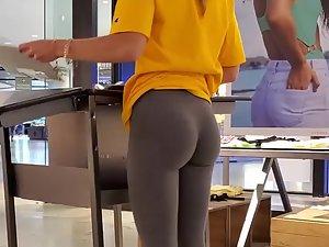 Store clerk with lovely little ass in grey tights