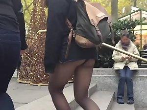 Ass in panyhose visible because of her backpack Picture 2