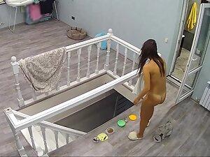Hidden cam caught incredible naked woman feeding her cat Picture 7