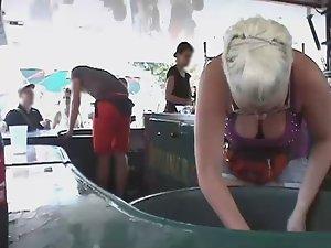 Busty waitress has to dig for cold drinks Picture 5