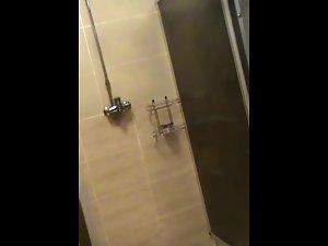 Spying on petite naked girl in fitness shower room Picture 8