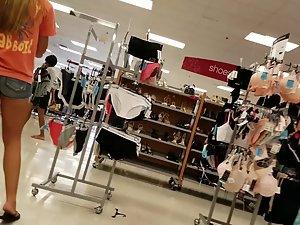 Peeping on hot teen girl while she shops for panties Picture 2