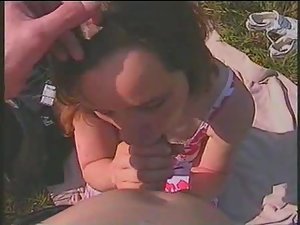 Girl sucks her man during a picnic Picture 3