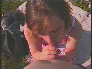 Girl sucks her man during a picnic Picture 5