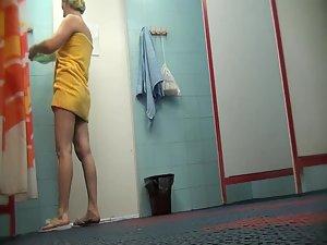 Milf got spied in a female locker room Picture 7