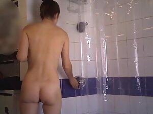 Spying on fit naked girl taking a shower Picture 1