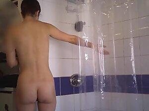 Spying on fit naked girl taking a shower Picture 3