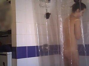 Spying on fit naked girl taking a shower Picture 4