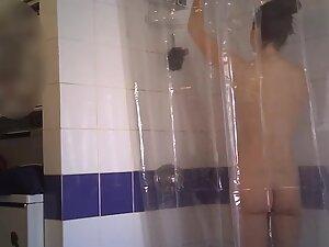 Spying on fit naked girl taking a shower Picture 5