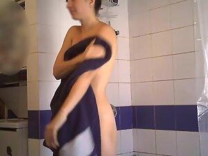 Spying on fit naked girl taking a shower Picture 8