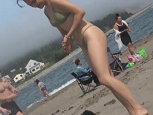 Checking out petite girl's ass and cameltoe in bikini Picture 3