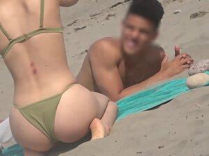 Checking out petite girl's ass and cameltoe in bikini Picture 7