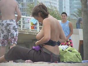 Boy can't stop looking at big natural tits Picture 8