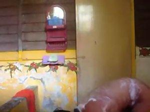 Mature asian lady spied while she soaps Picture 4