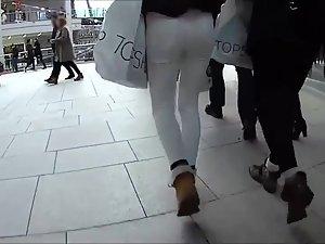 Following a firm butt in white pants Picture 3