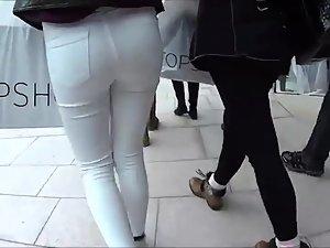 Following a firm butt in white pants Picture 5