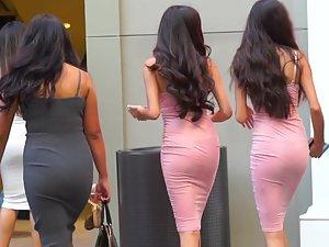 Beautiful twin sisters in matching pink dresses Picture 7